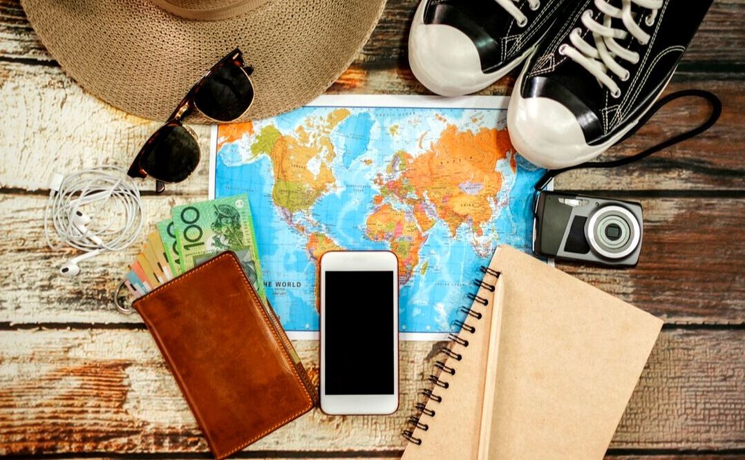 Travel accessories - phone, sunglasses, notebook, shoes, camera